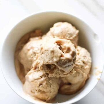 4 scoops of peanut butter banana ice cream in a white bowl