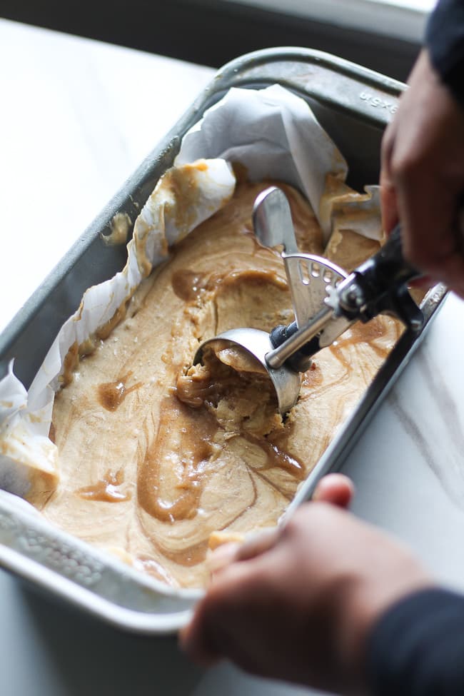 peanut butter banana ice cream being scoop out
