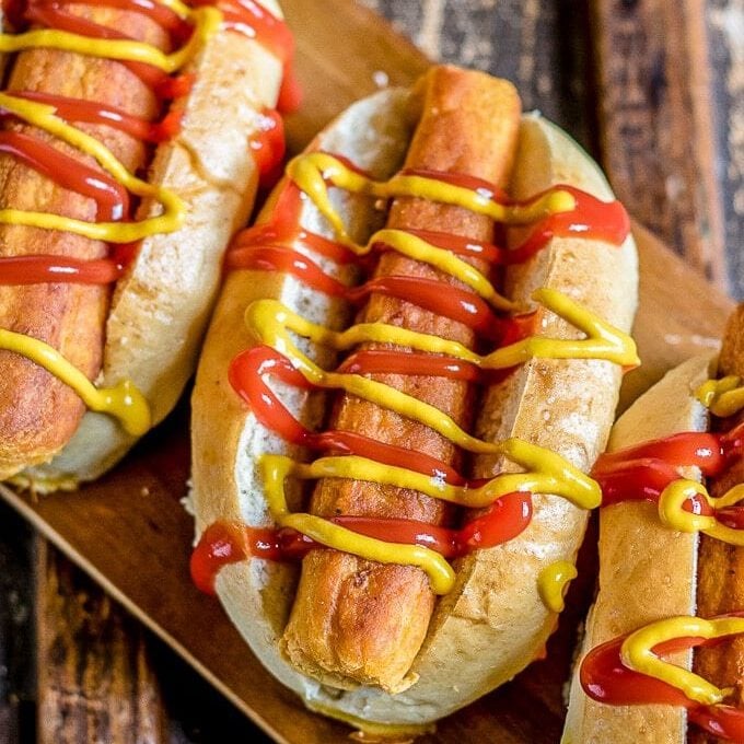 veggie dogs on a bun with mustard and ketchup
