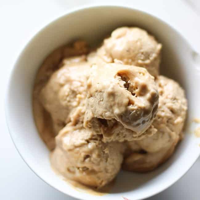 4 scoops of peanut butter ice cream in a white bowl