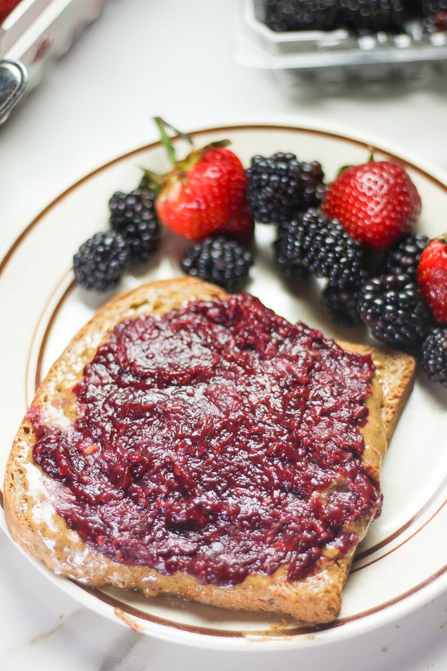 blackberry jam on top of walnut butter and spelt bread with a side of berries