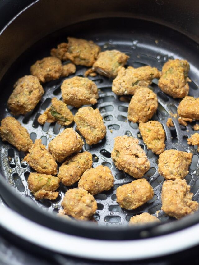 fried okra in an air fryer basket