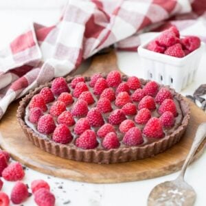chocolate tart topped with fresh raspberries
