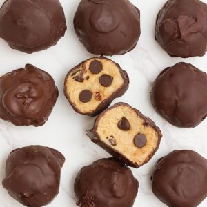 chocolate chip cookie dough truffles on a white table