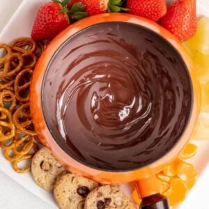 chocolate fondue on a white tray