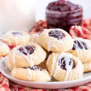 thumbprint cookies on a white plate