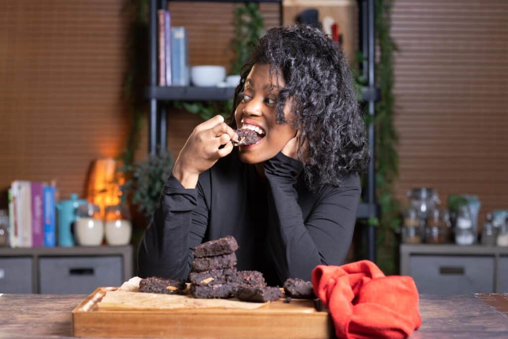 Gina Marie eating vegan brownies