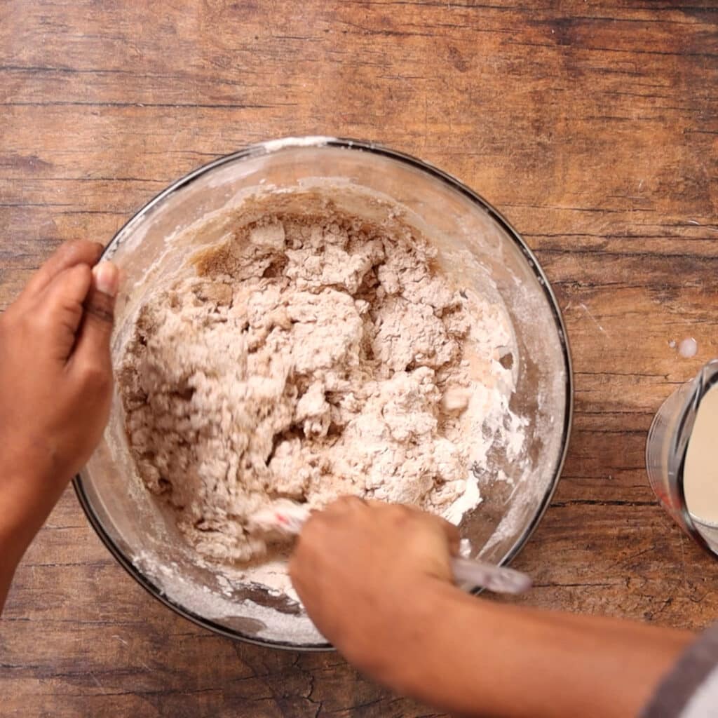 mixing flour batter together with liquid