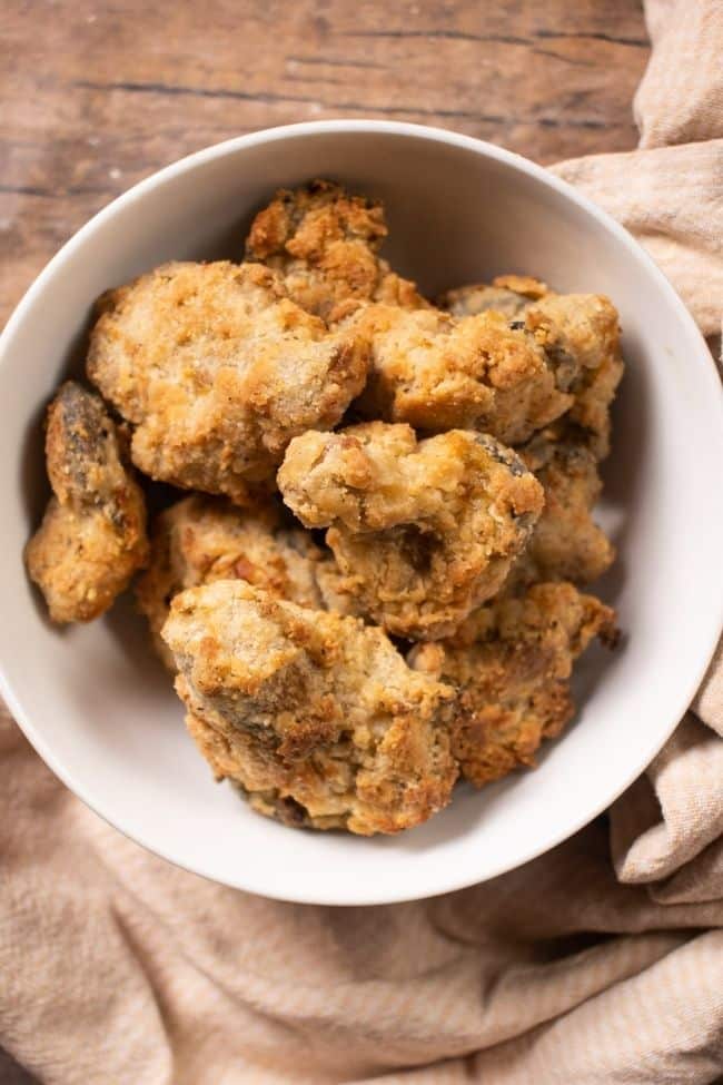 air fried oyster mushrooms in a white bowl