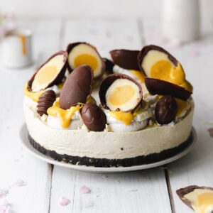 vegan cheesecake with vegan creme eggs on top