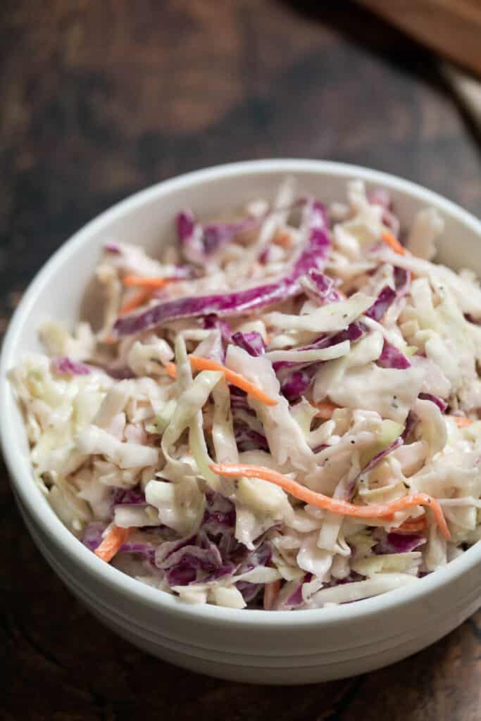 vegan coleslaw in a white bowl