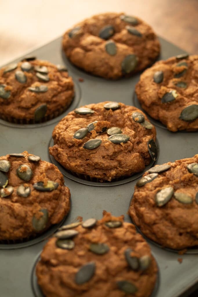 pumpkin muffins in a muffin pan