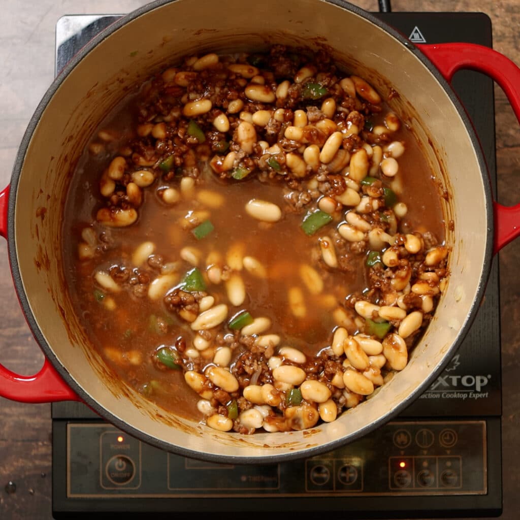 water added to Dutch oven with beans