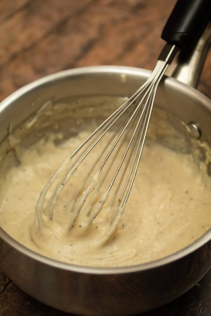 cream of chicken in a mason jar in a saucepan