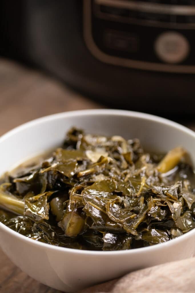 collard greens in a white bowl