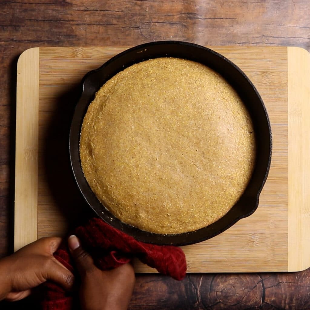 baked cornbread in a cast iron skillet