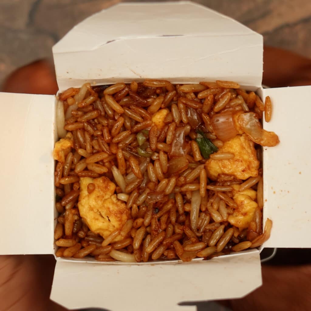 fried rice in a take out box