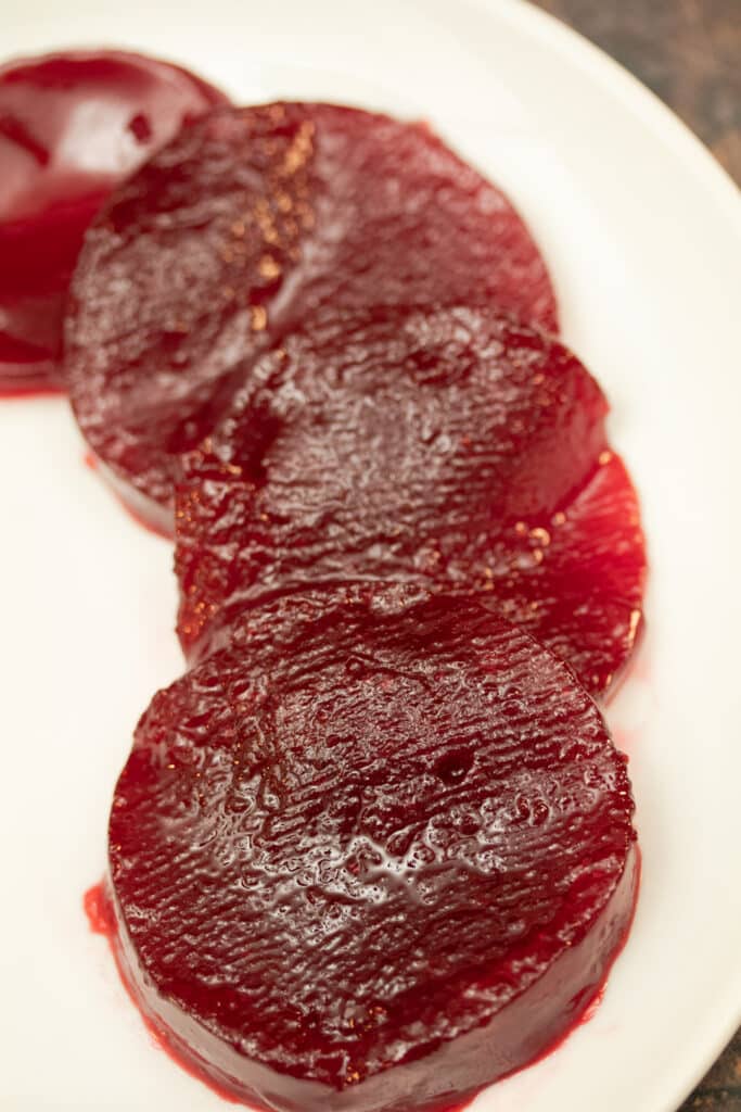 jellied cranberry sauce on a white plate