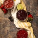 strawberry, blackberry, and raspberry chia jam in small mason jars