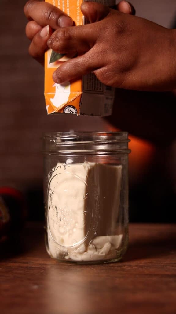 tofu going in wide mouth jar